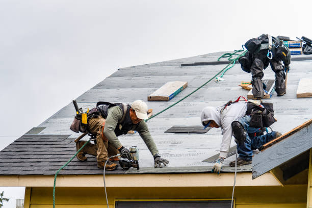Professional Roofing technician working in Riverside, CT